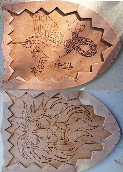 2 pyrographed shields.jpg